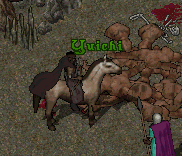 Yuichi looks down on a corpse in a satisfied condition.